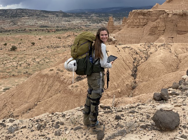 A woman backpacking